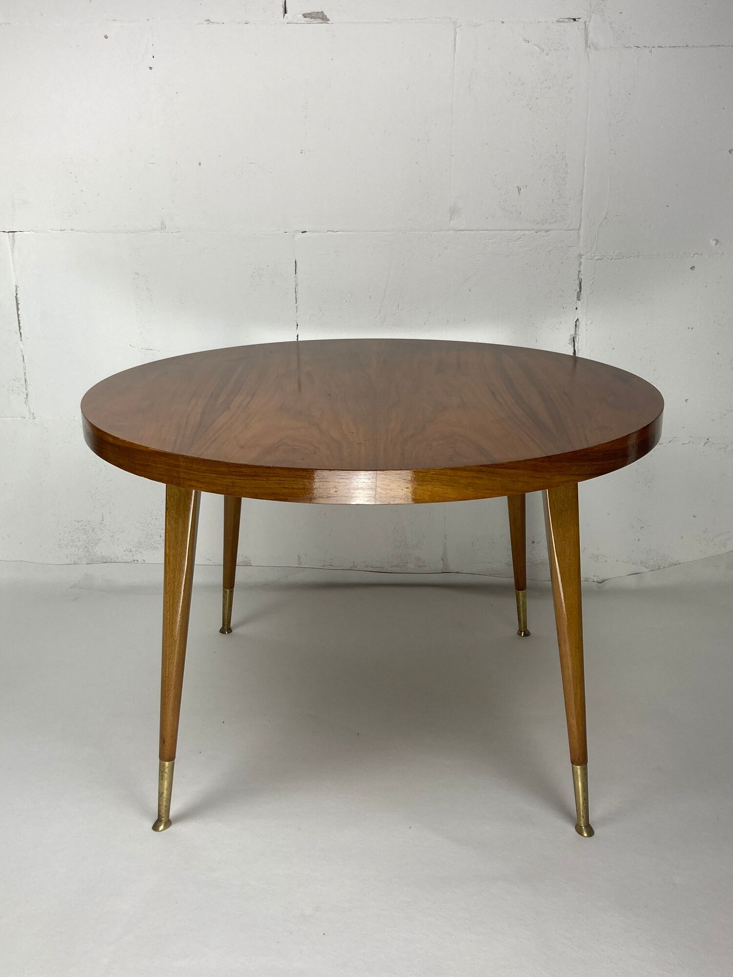 Italian round table with tapered brass leg ends, 1950s