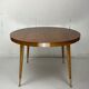 Italian round table with tapered brass leg ends, 1950s