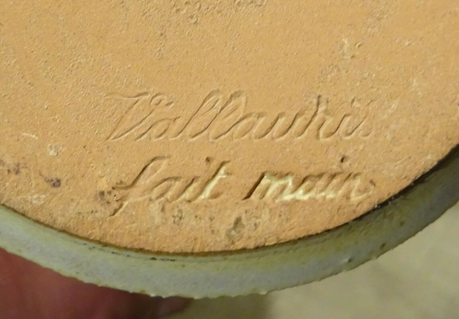 Bottle decorated with Vallauris foliage