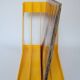 Yellow plastic vinyl racks from the 70s