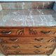 Art Deco commode with marble top, vintage antique furniture.