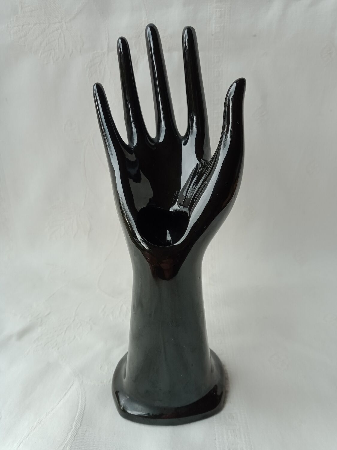 Black ring sizer hand