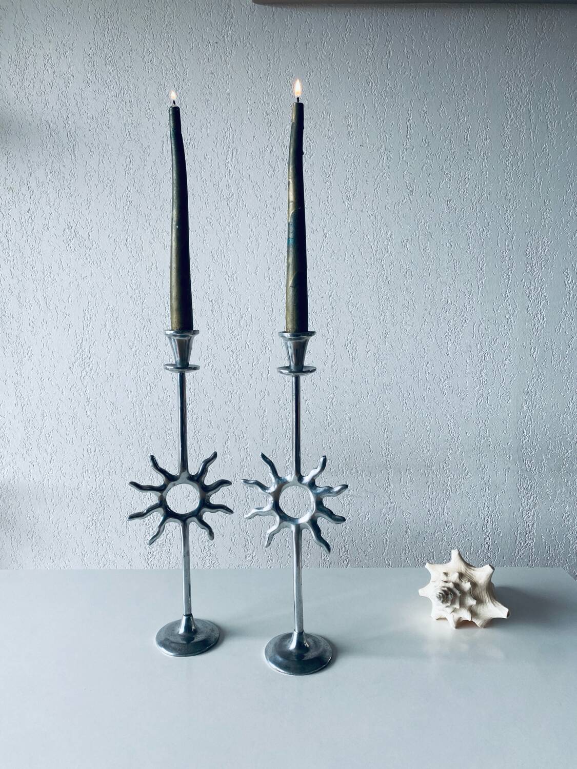 Pair of sun candle holders