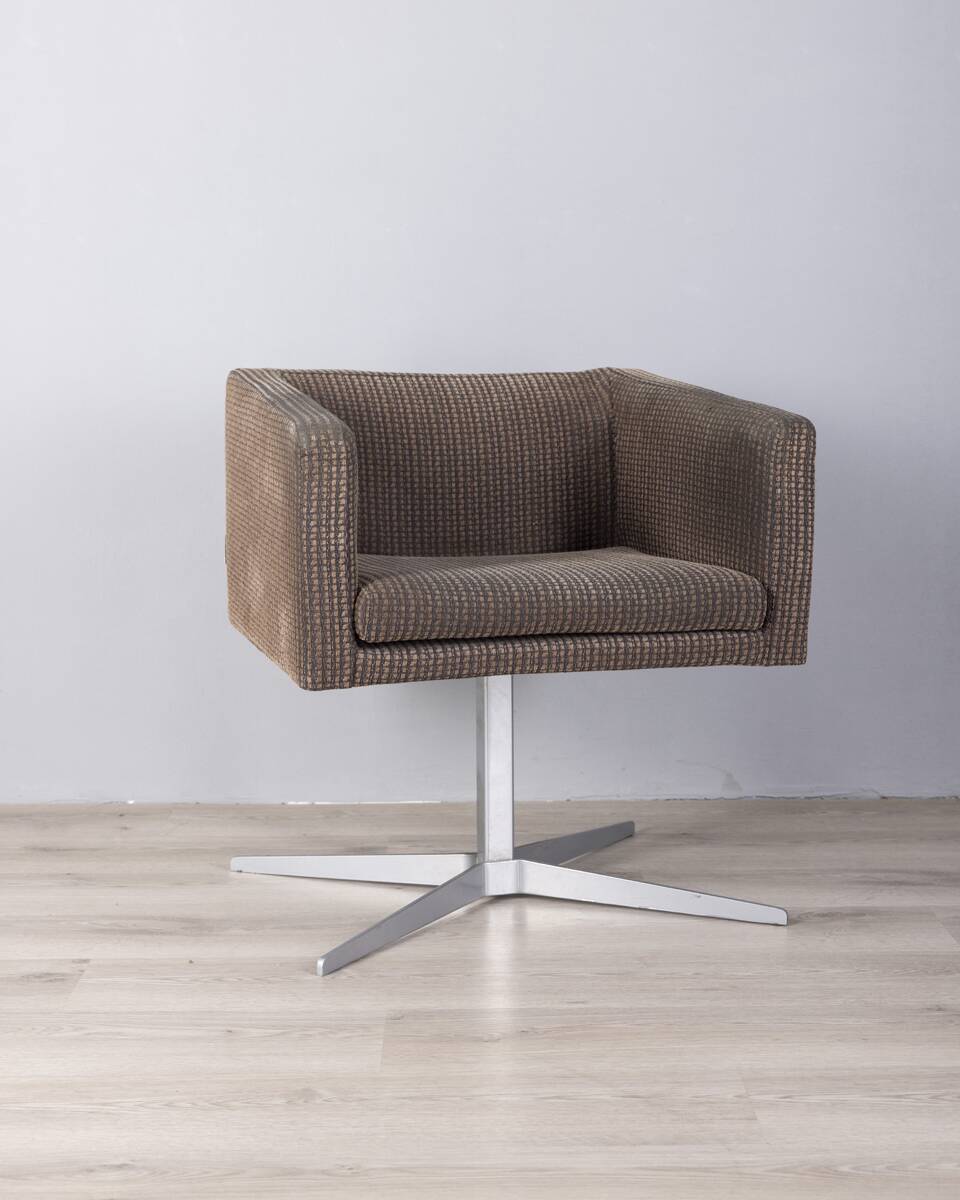 "Cubica" metal and fabric swivel armchair designed by Verzelloni