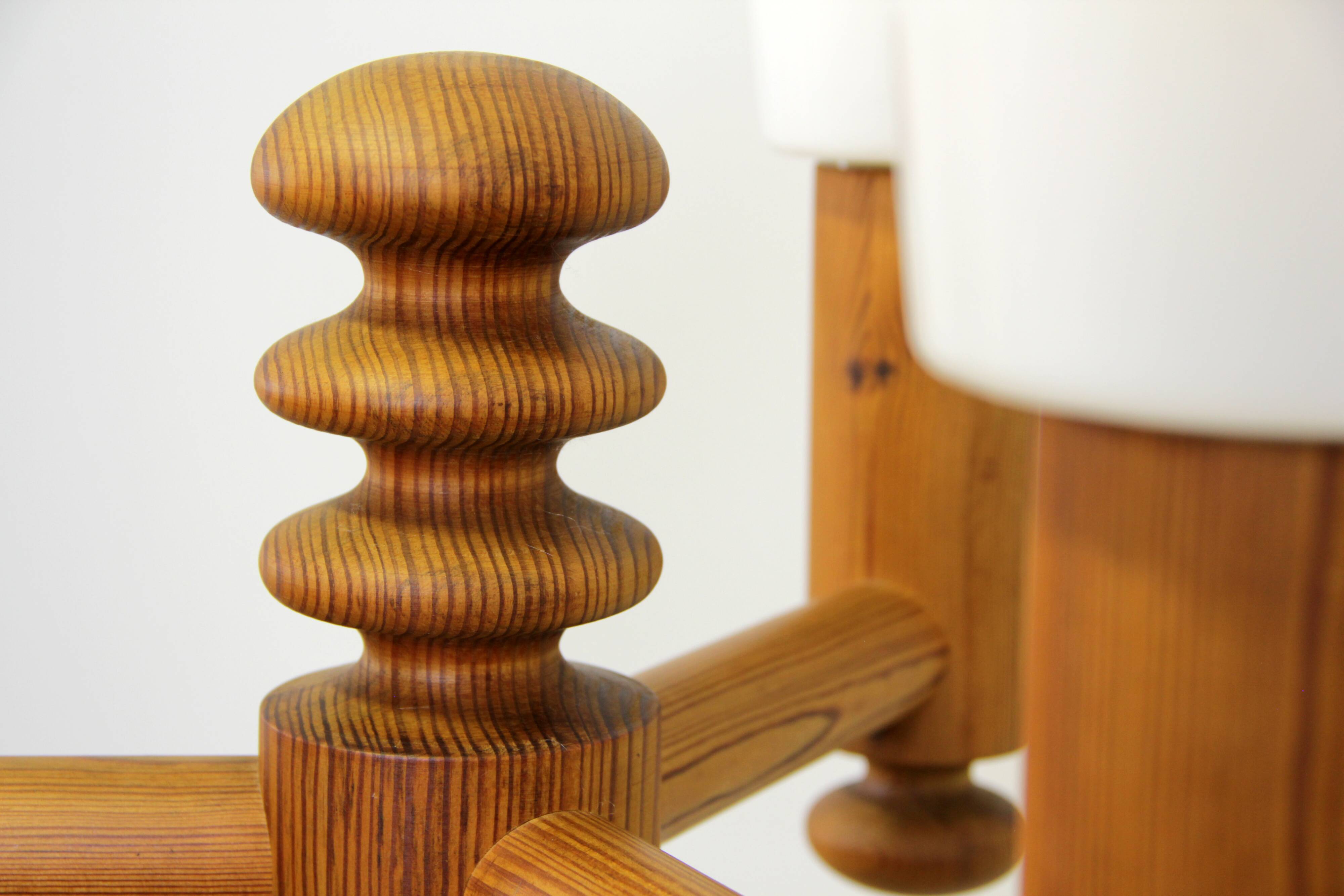 Turned solid pine floor lamp by Uno Kristiansson for Luxus Sweden, 1970s