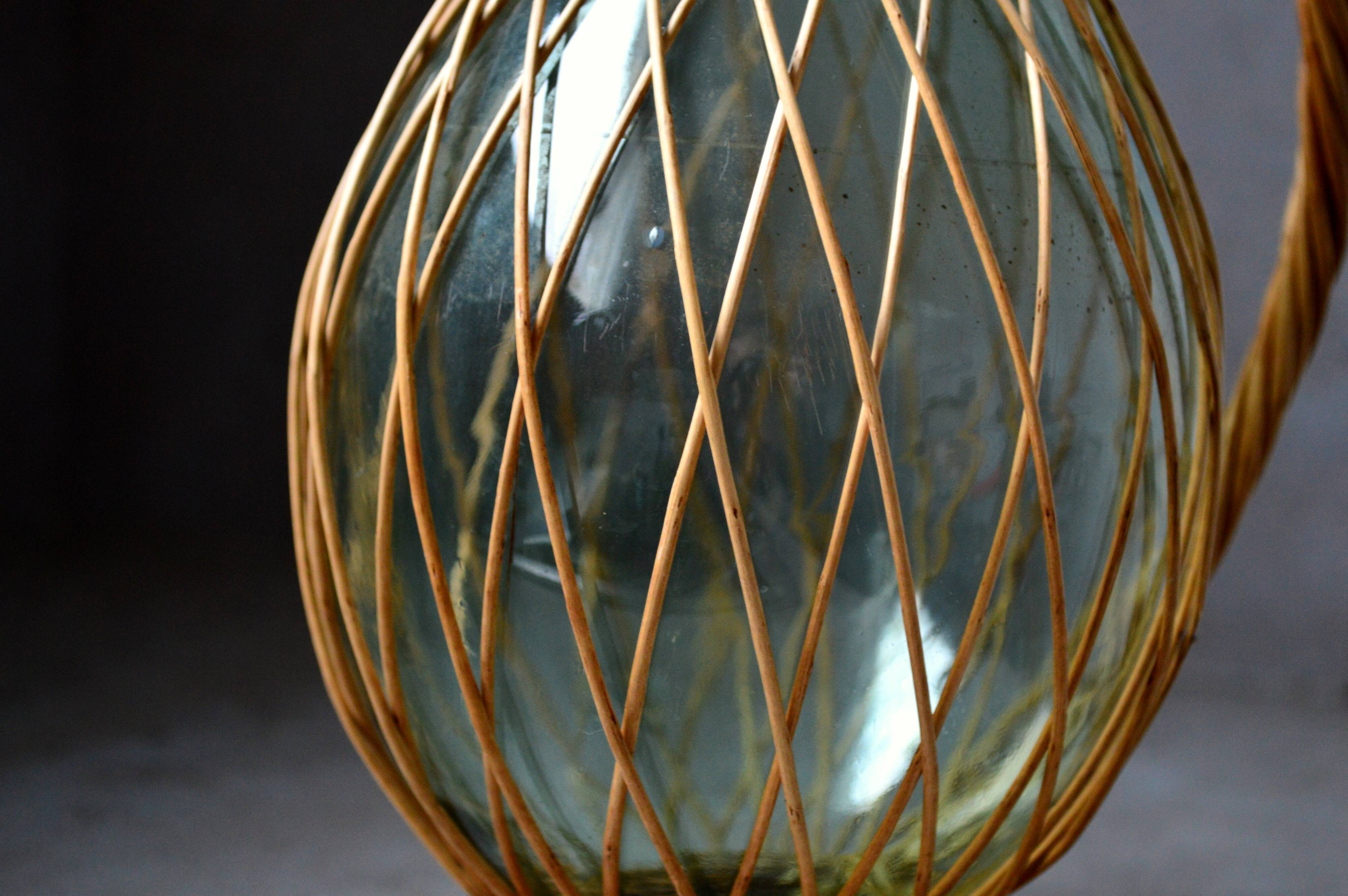 Vintage glass and rattan bottle