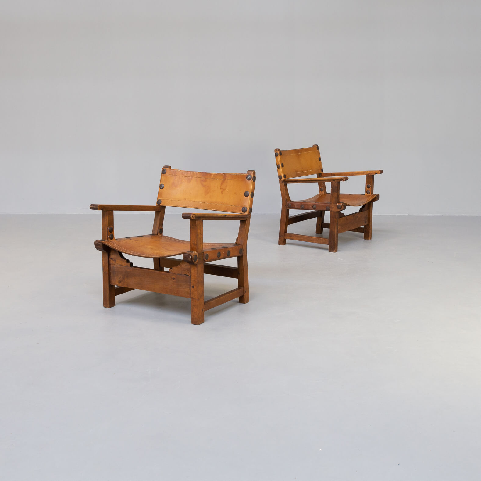 50s oak brutalist spanish chair with saddle leather