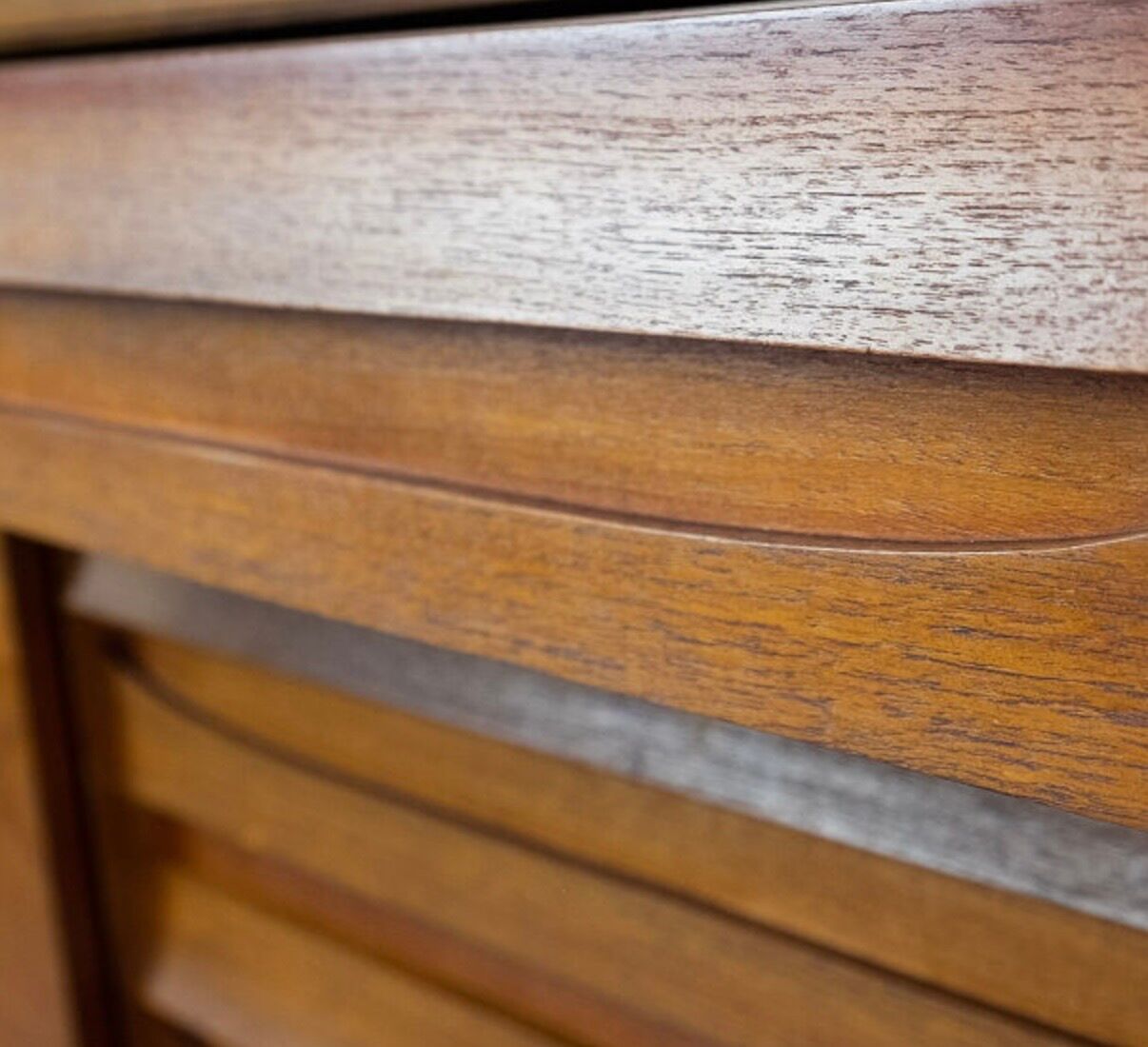 Teak sideboard with sliding door and drawers, 1960s.