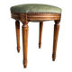 Tabouret repose-pieds en velours vert amande