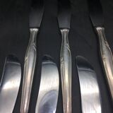 12 silver metal knives