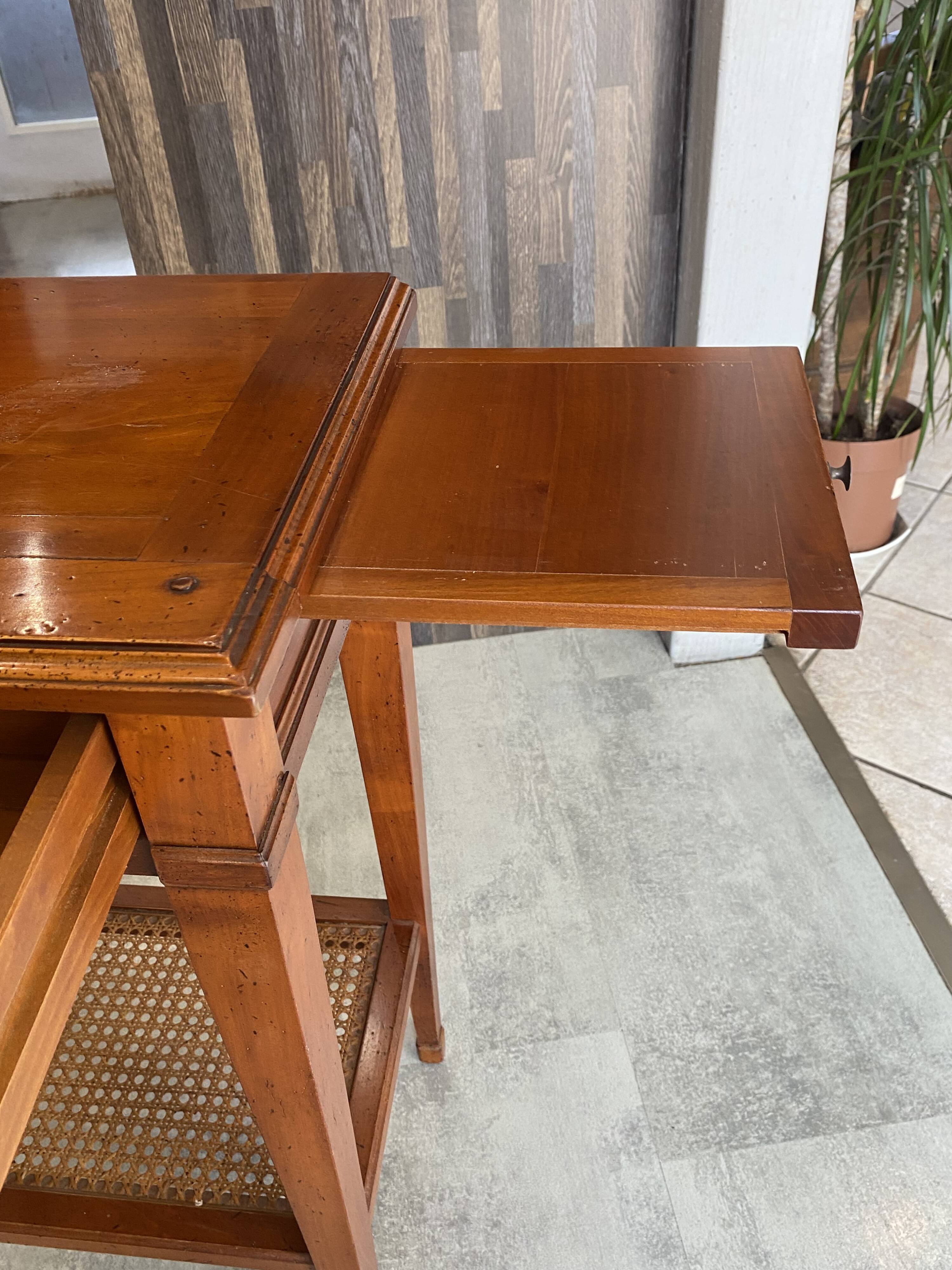 Occasional table in cherry wood, 1 drawer, 1 cane shelf, 1950.