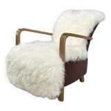 Scandinavian style armchair in leather and hide