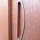 Low sideboard with 3 sliding doors in teak. Denmark 1960