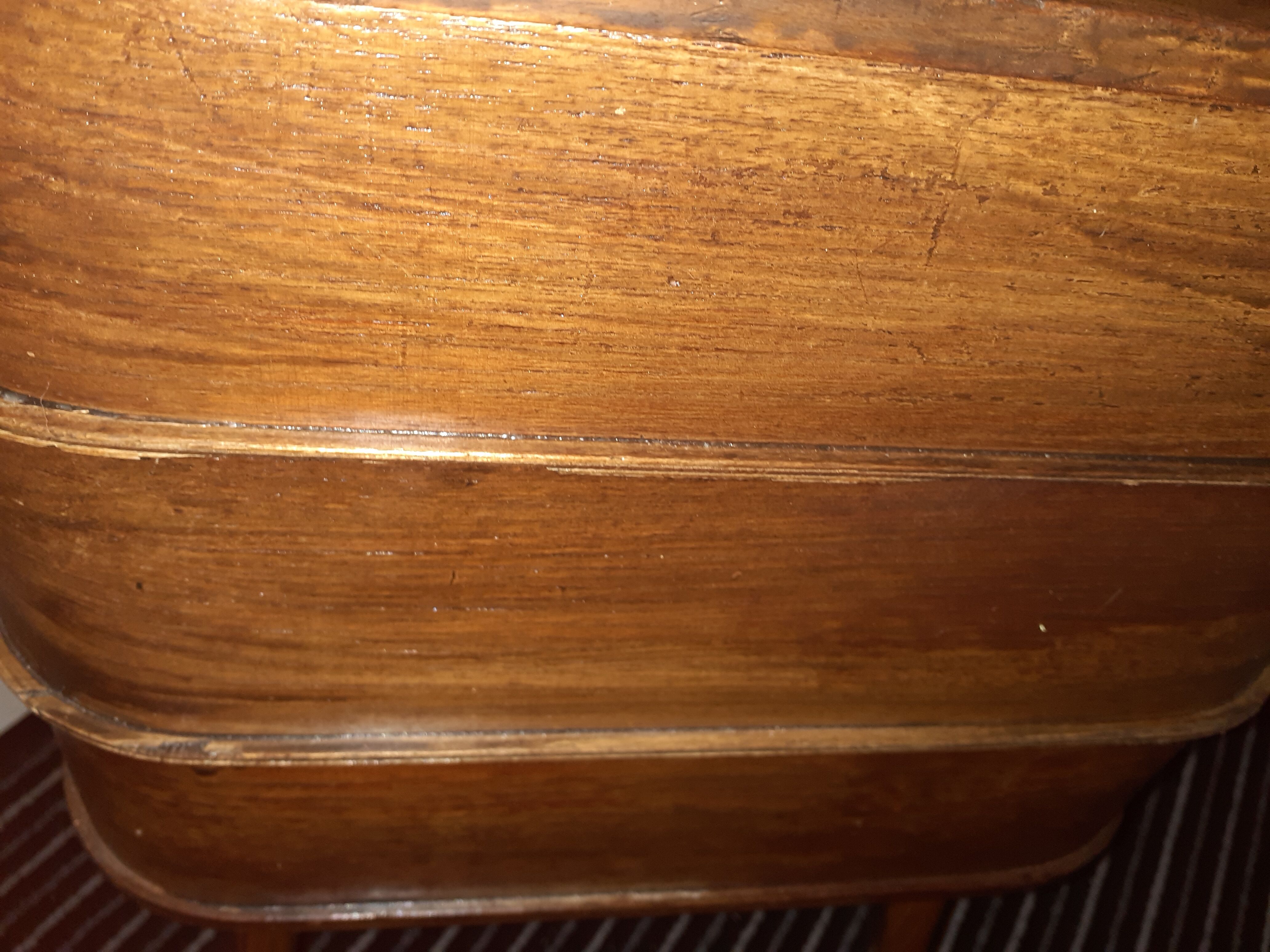 Wooden storage furniture with drawers. With a cove.