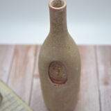 Terracotta vase with crushed glass