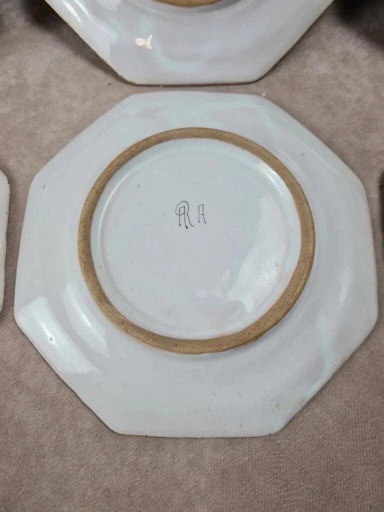 Set of 12 small antique plates by Alfred Renoleau, different designs.