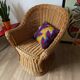 Braided wicker armchair
