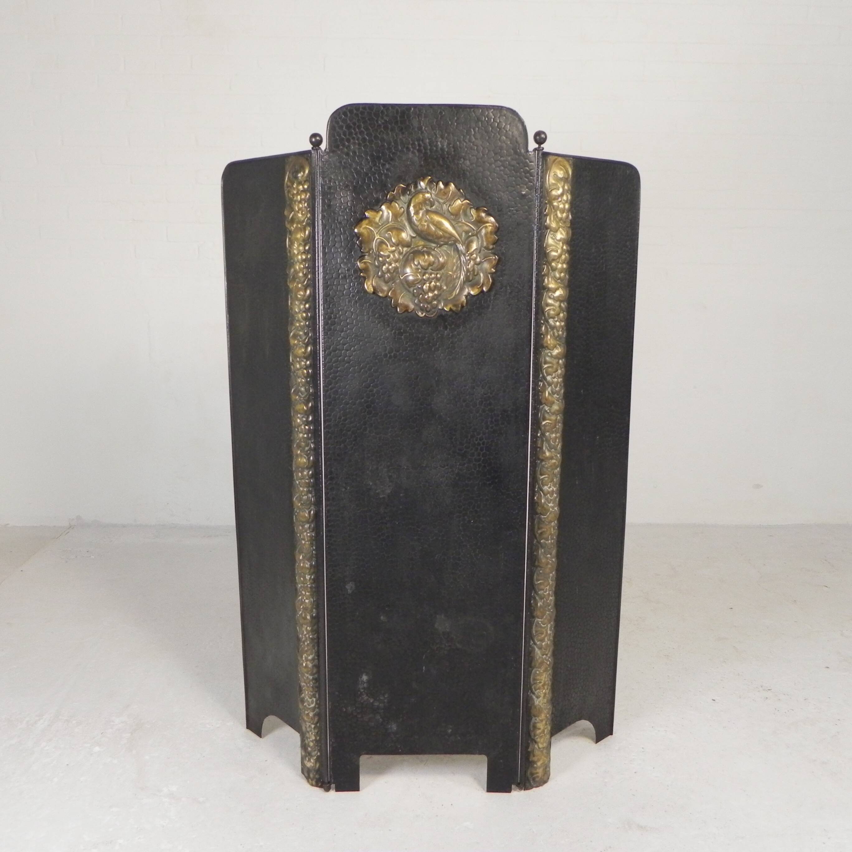 Art Deco screen in steel with brass details, 1930s.