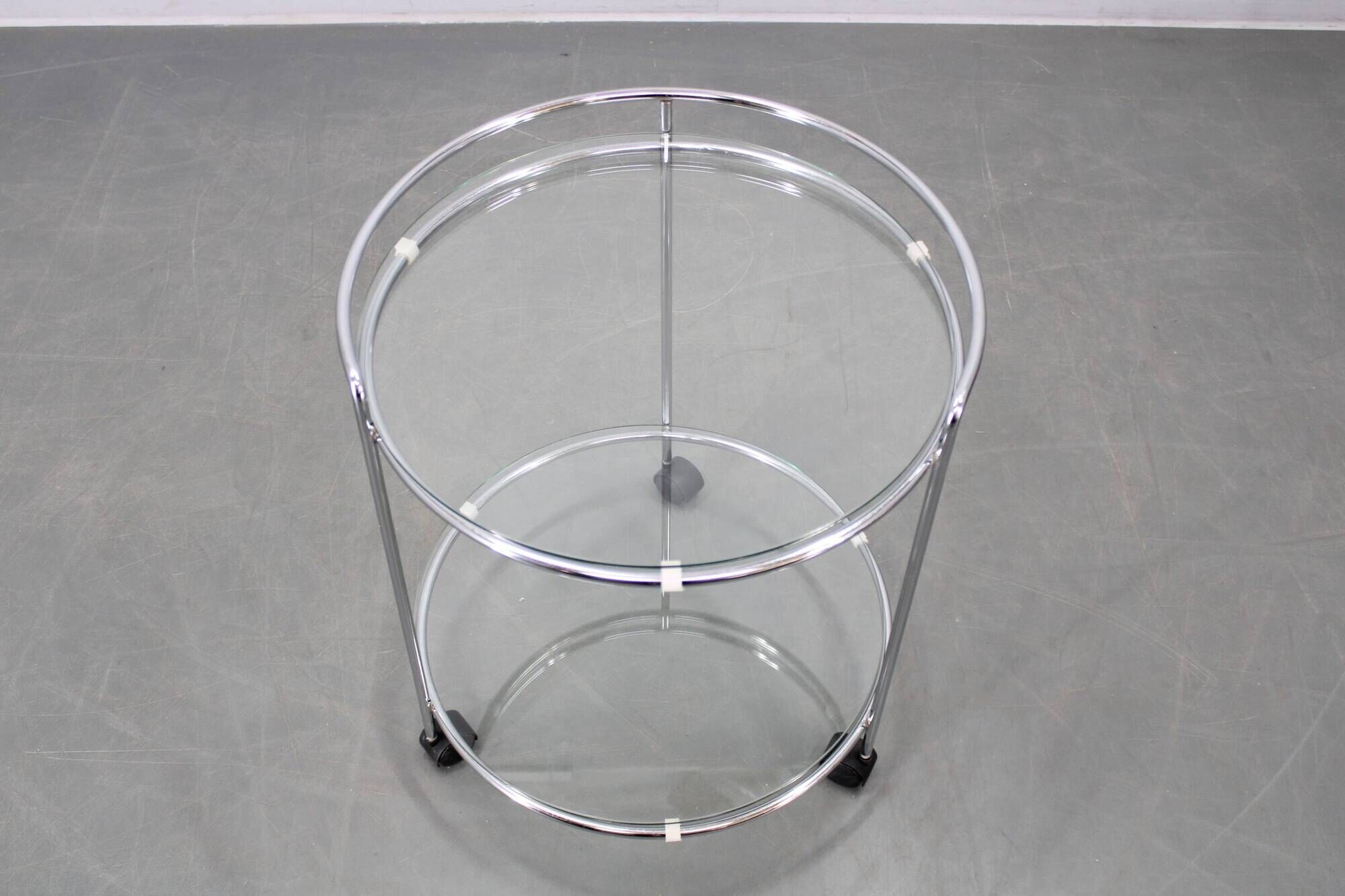 Mid-century round serving table, chrome and glass, Italy, 1980s