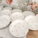 Lot de 12 assiettes à dessert en porcelaine de Limoges décor floral doré