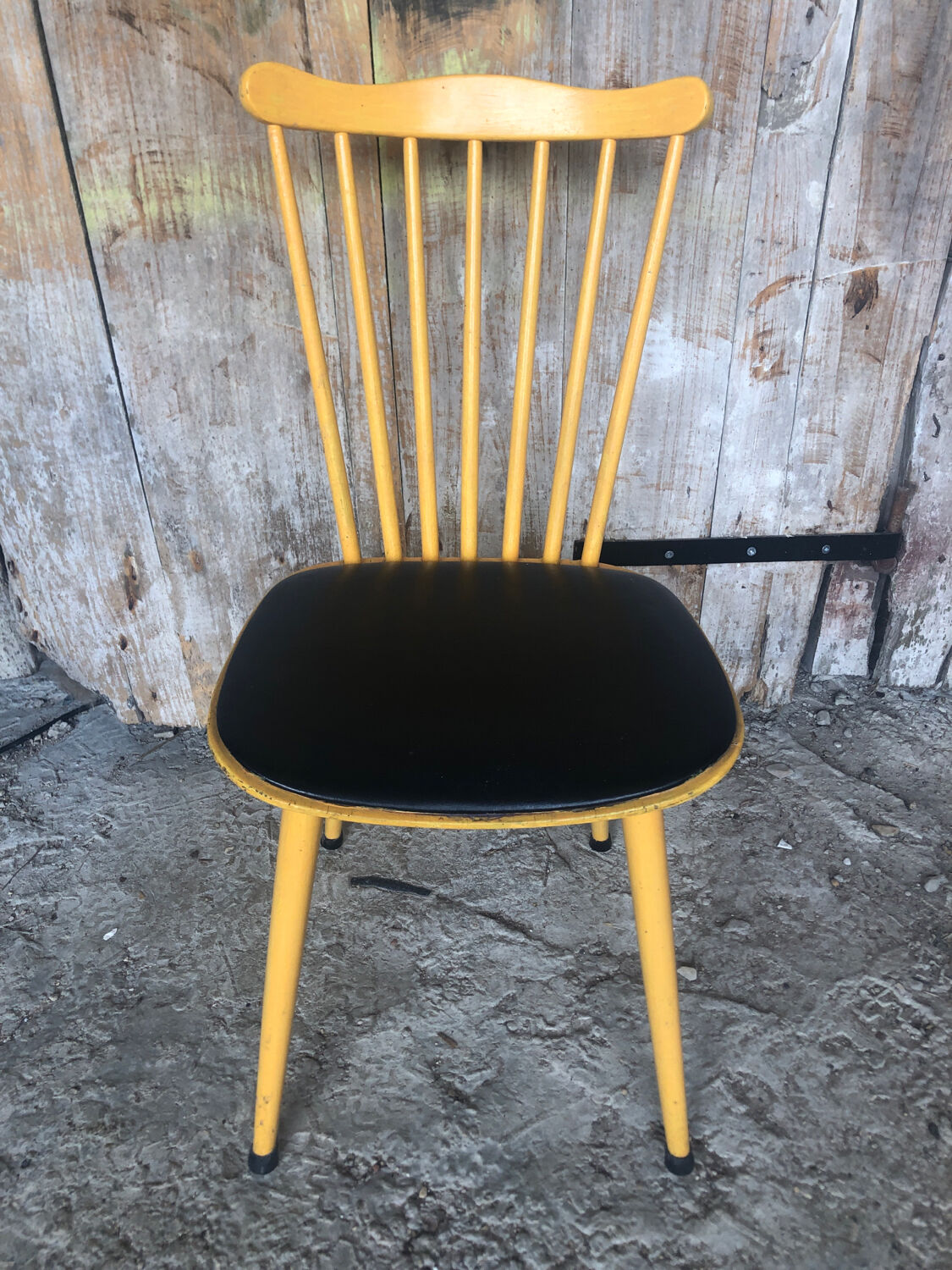 Baumann western style chair in yellow wood + vintage black skai seat