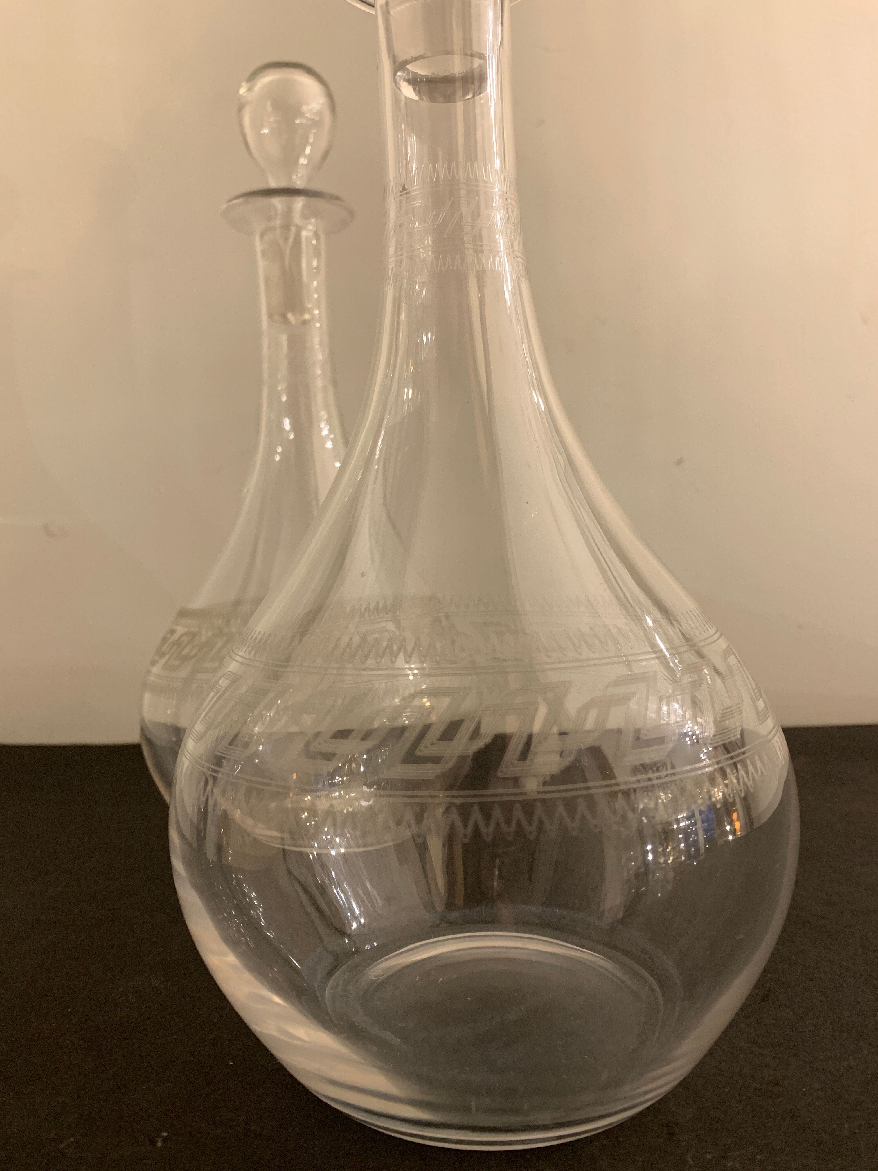 Pair of ancient decanters made of Baccarat crystal, Greek friezes