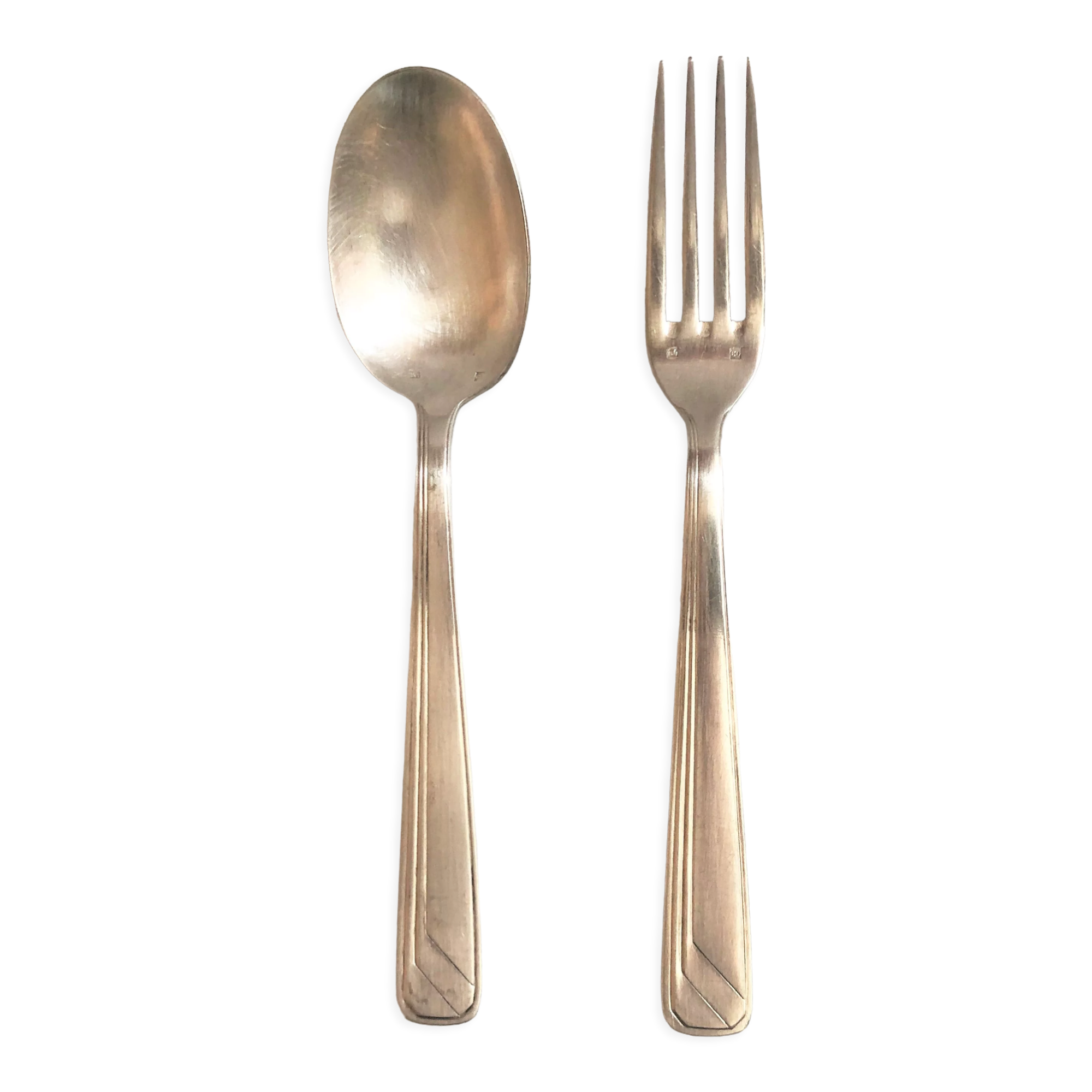 Set of 2 silver metal cutlery with punches