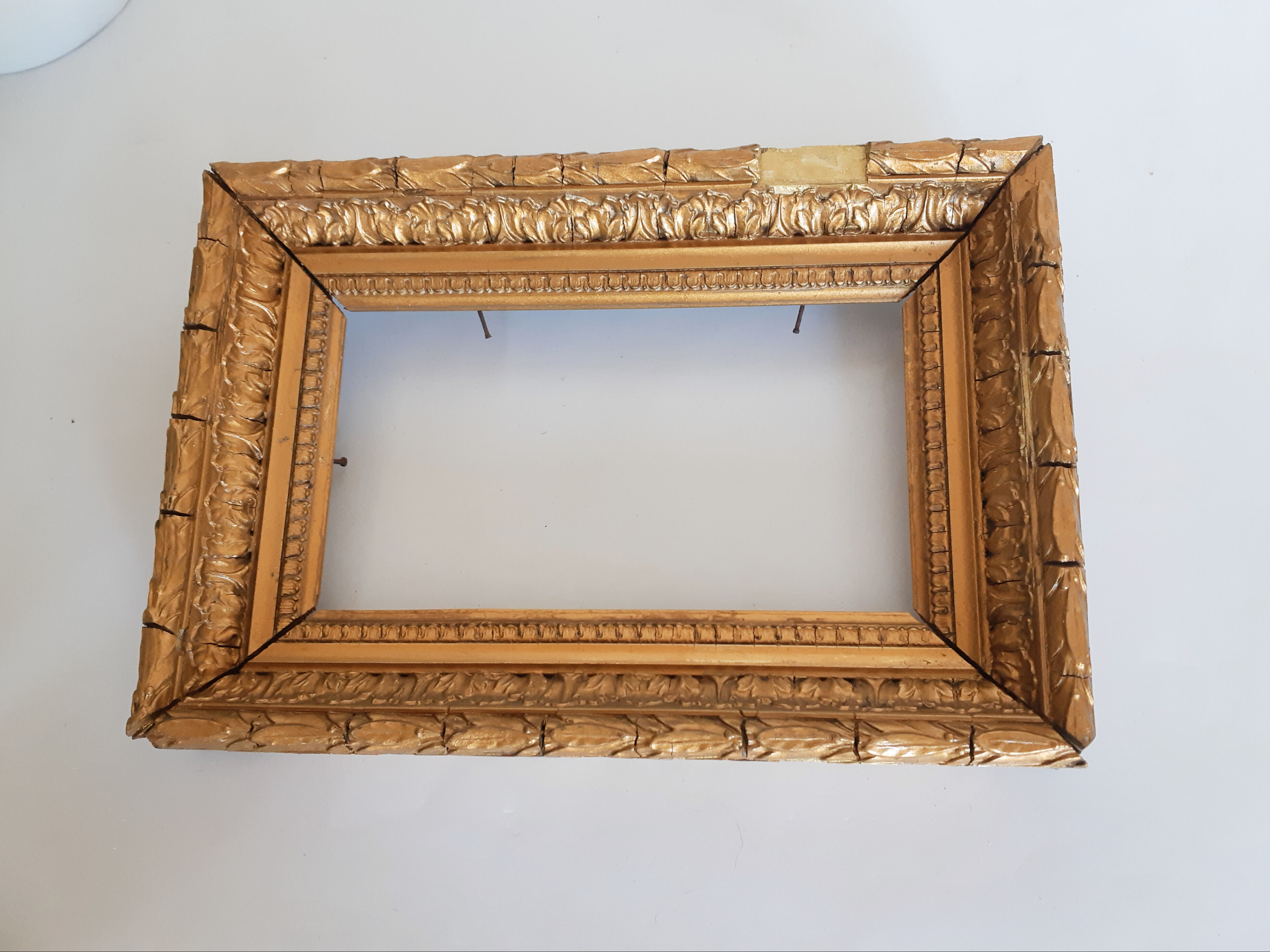 Molded frame in wood and gilded stucco, XIXth, 25 cm x 17 cm