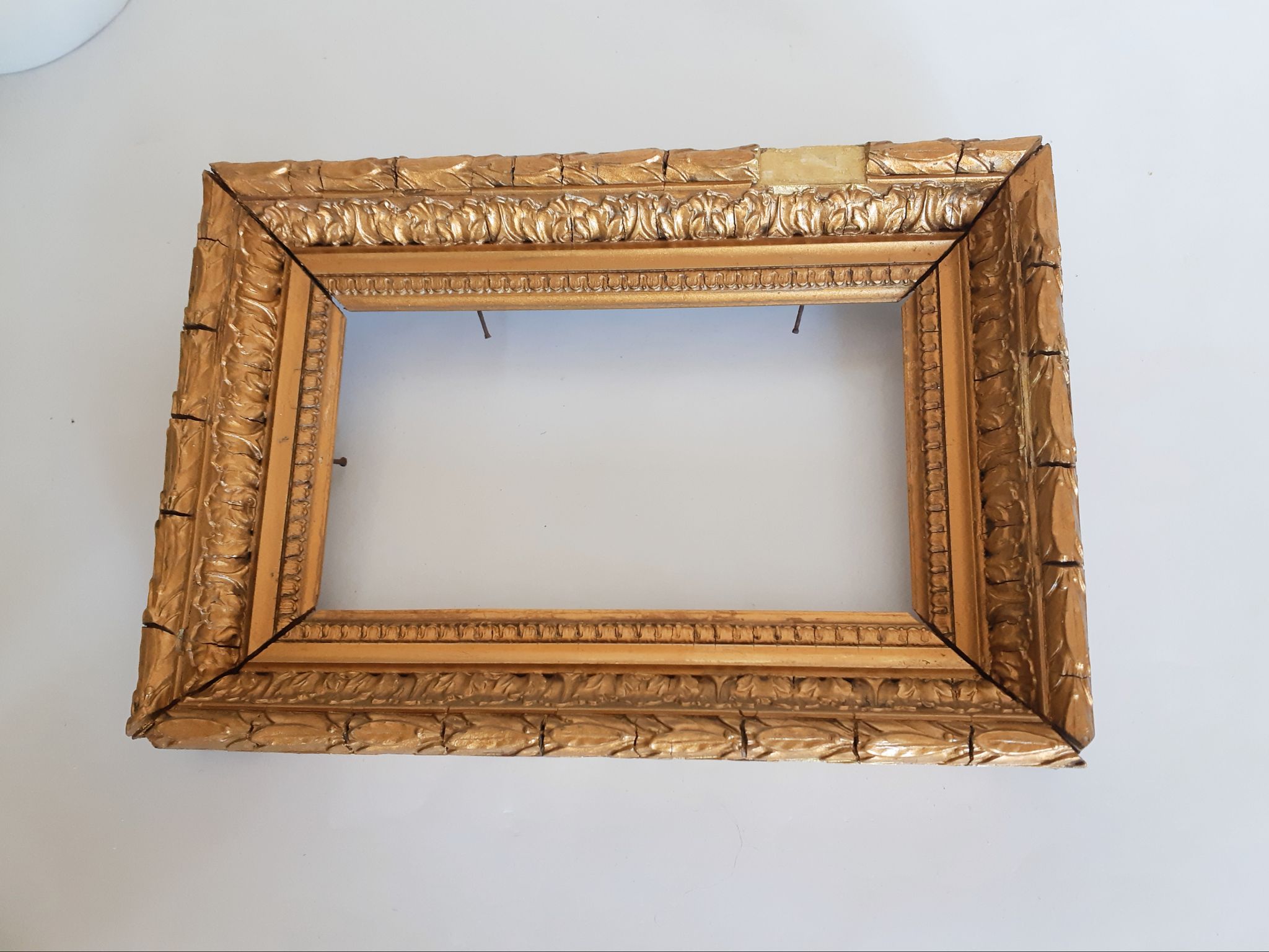 Molded frame in wood and gilded stucco, XIXth, 25 cm x 17 cm