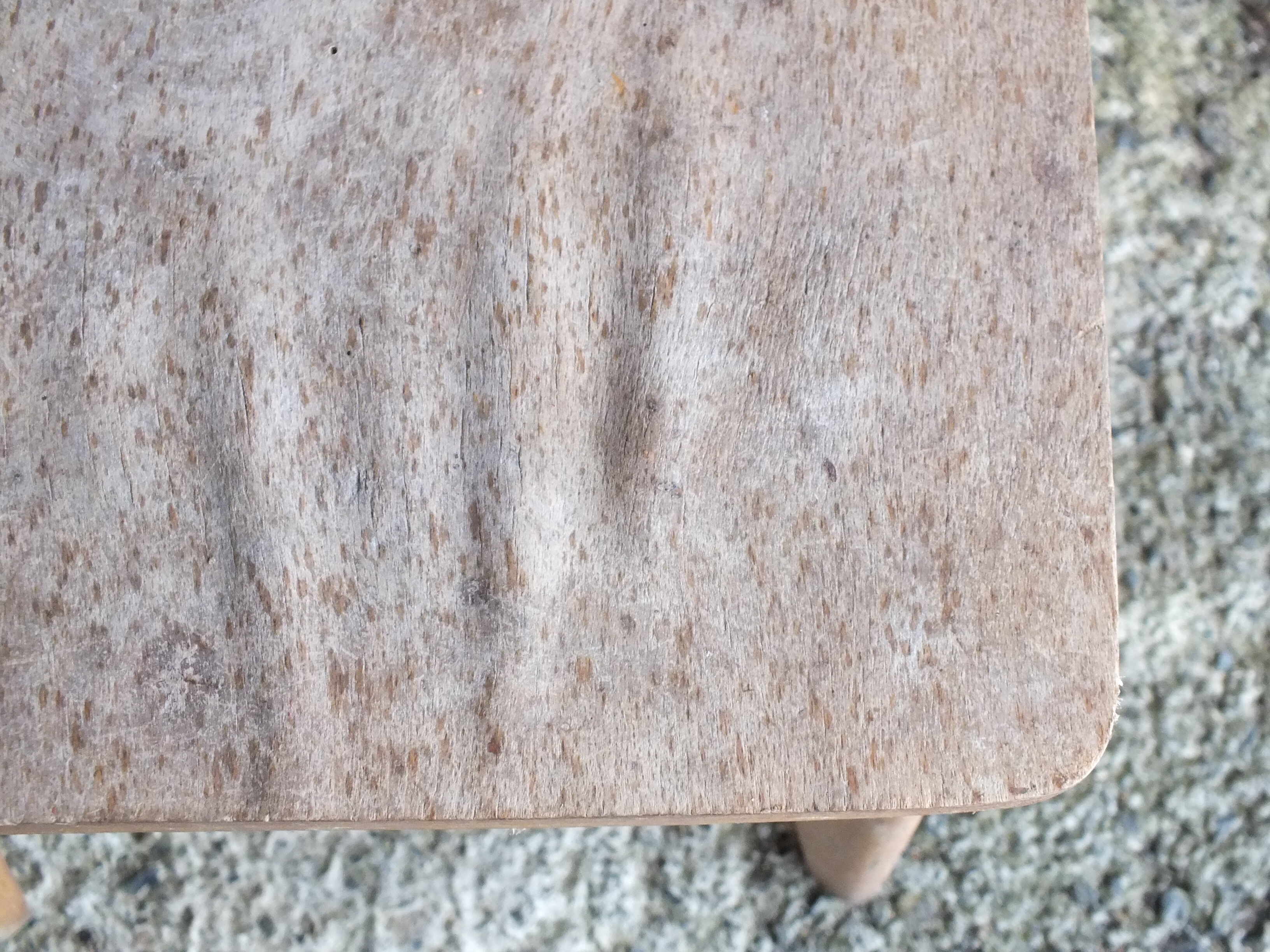 Vintage wooden stool with 4 legs from the 50s