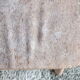 Vintage wooden stool with 4 legs from the 50s