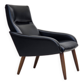 1970s, Danish armchair, black artificial leather, teak wood legs.