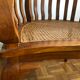 Fauteuil colonial canné en bois exotique