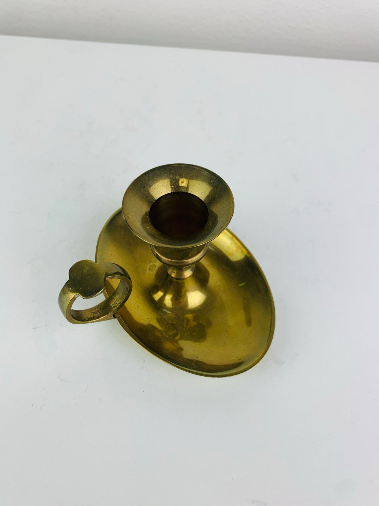 Vintage brass candlestick, rat of the cellar.