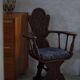 Scandinavian armchair in solid oak with cushion, folk art, early 19th century.