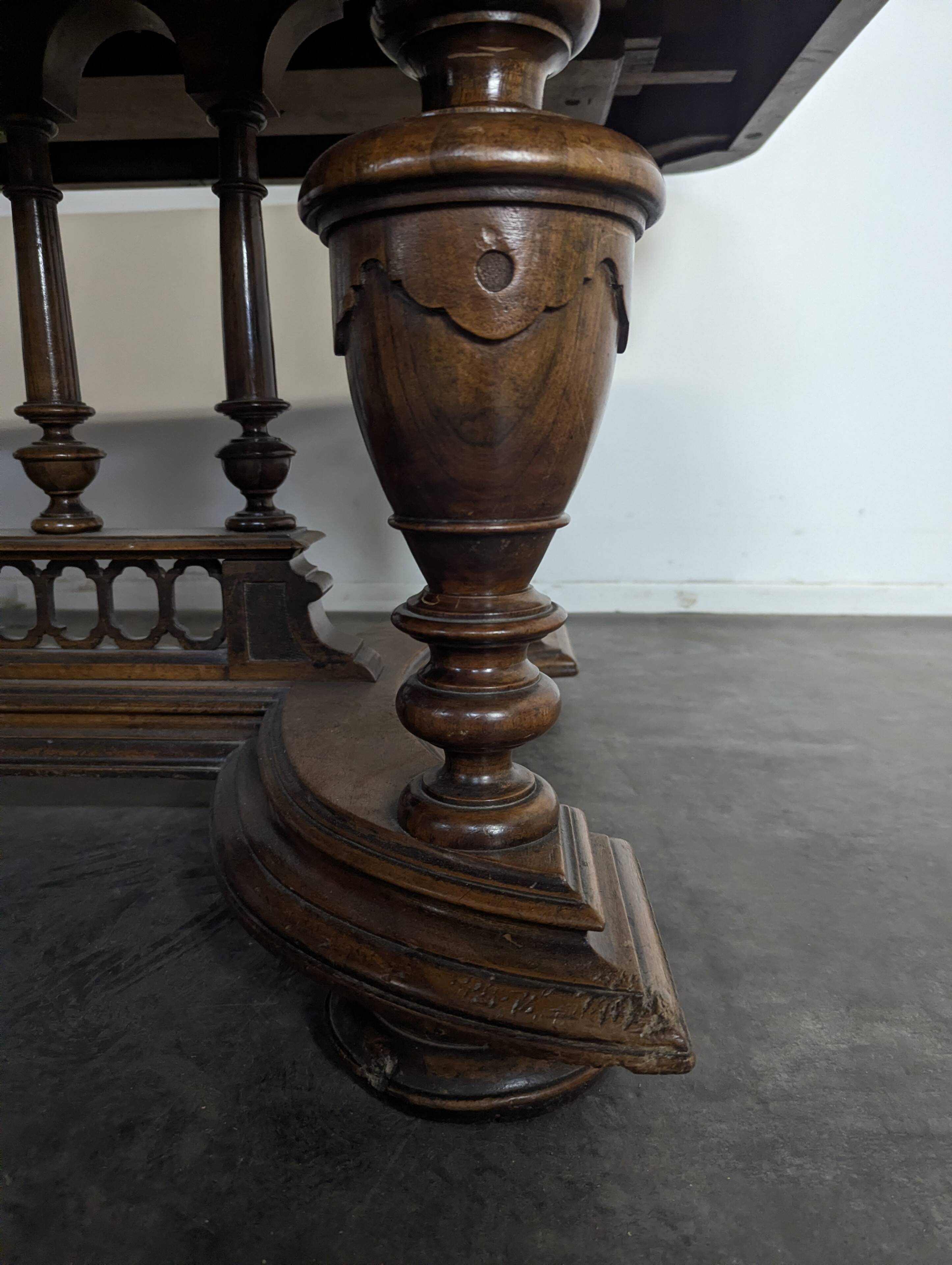 Renaissance-style table in solid walnut