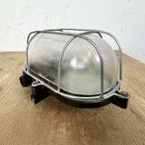 Industrial brown bakelite wall light with frosted glass, 1960s