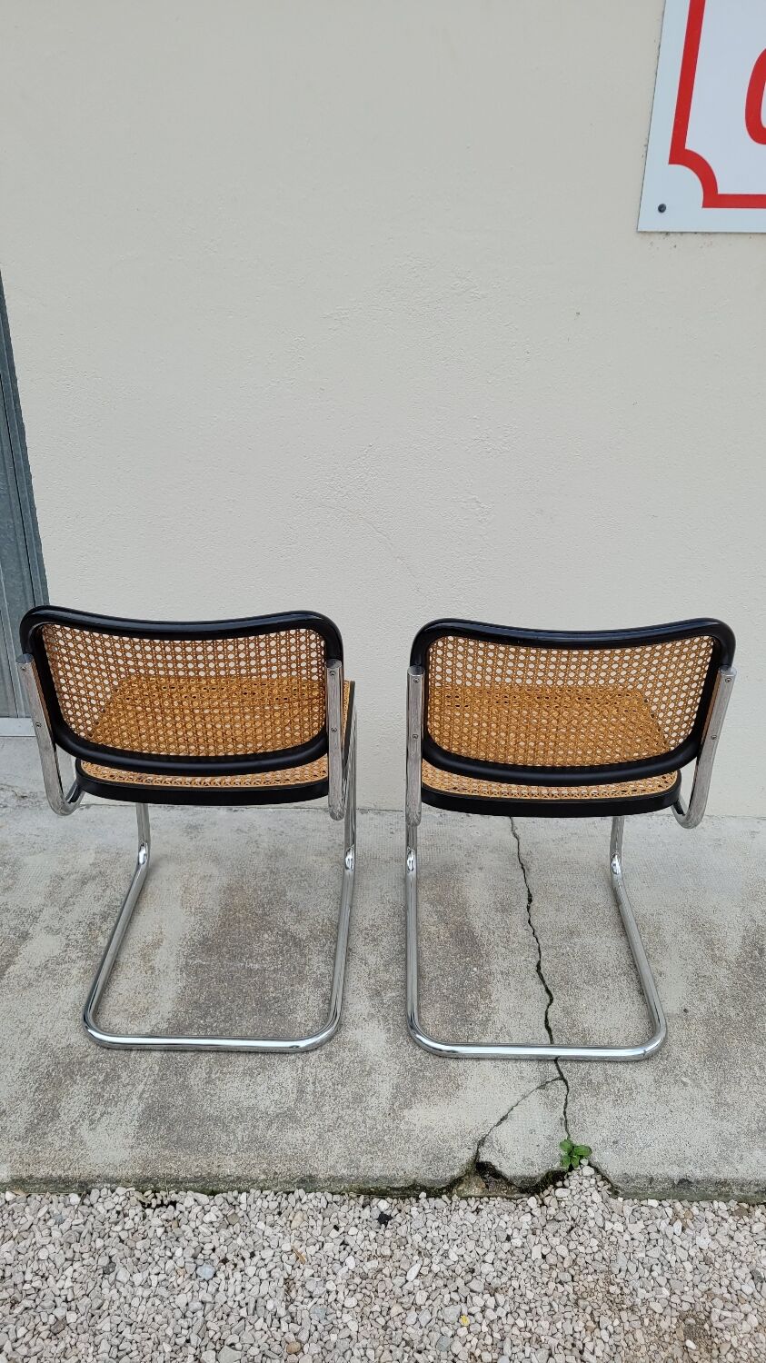 Pair of chairs by Marcel Breuer in black canework model B32 signed Italy