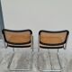 Pair of chairs by Marcel Breuer in black canework model B32 signed Italy