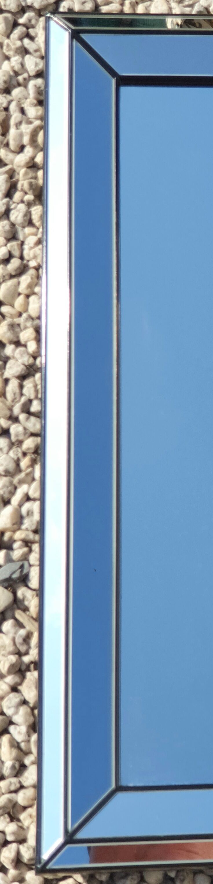 Vintage mirror deknudt with 70's parecloses