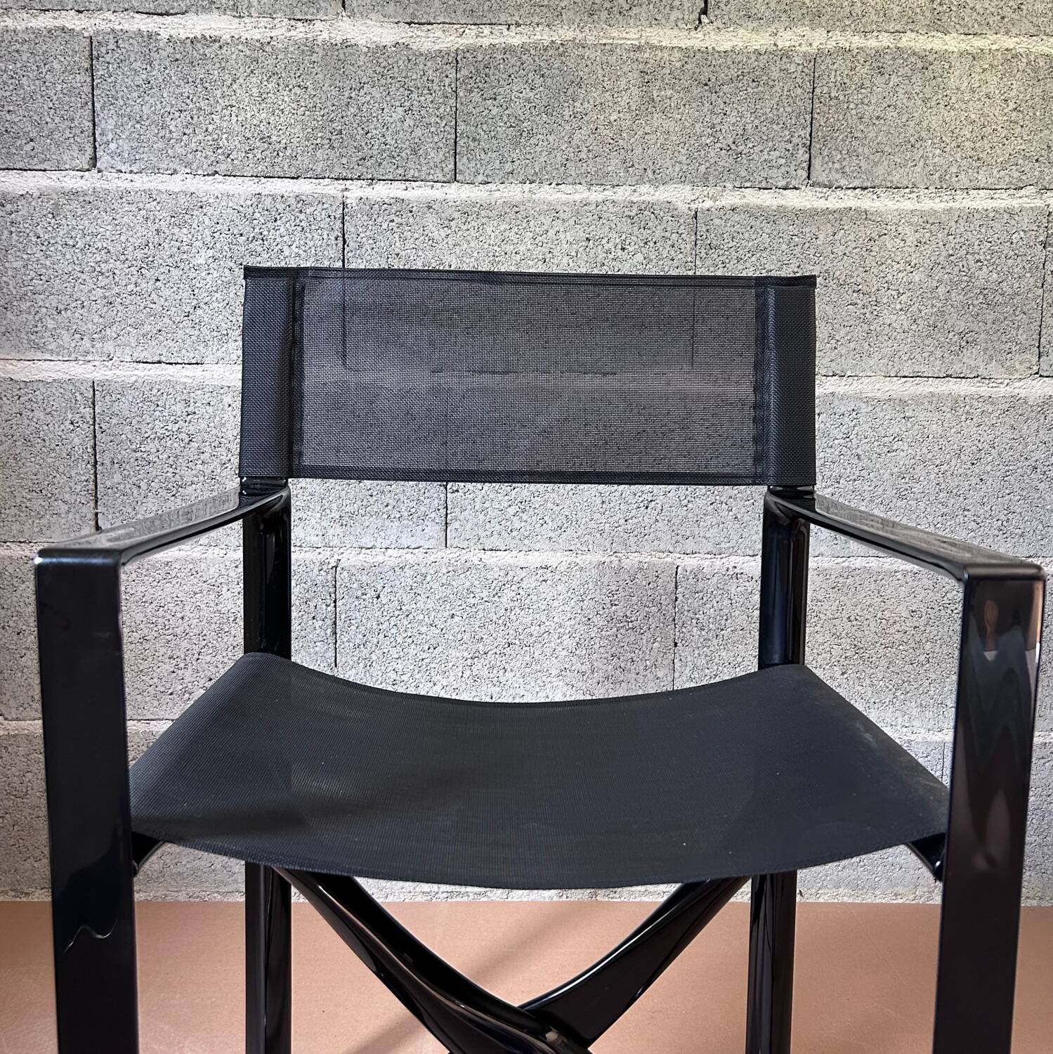 Shiny black folding chair Regista