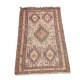 Hand-knotted silk carpet purchased in Iran – geometric and animal design –