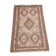 Hand-knotted silk carpet purchased in Iran – geometric and animal design –