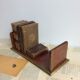 Folding bookend in Wood and Brass late nineteenth early twentieth