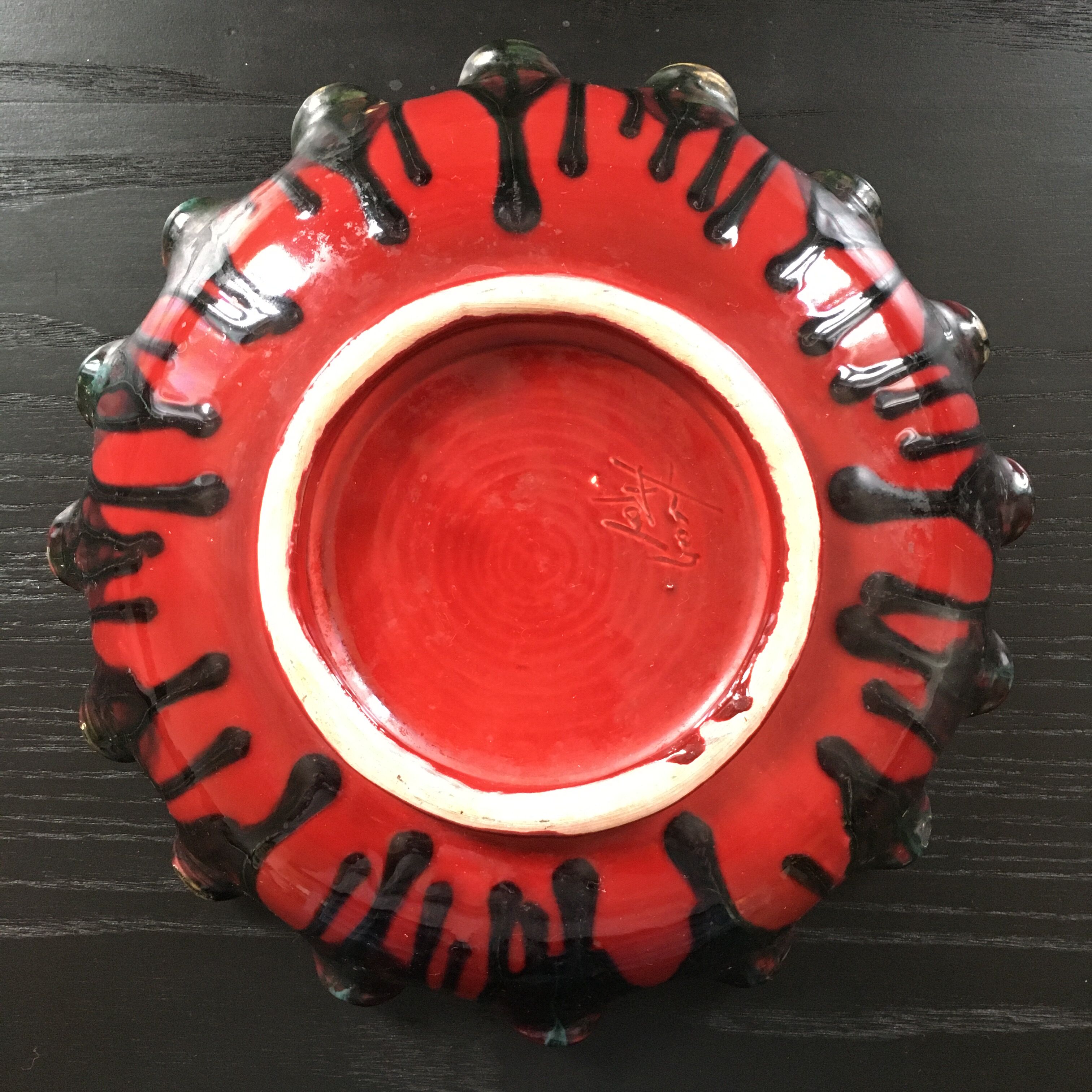 Shallow corolla dish signed