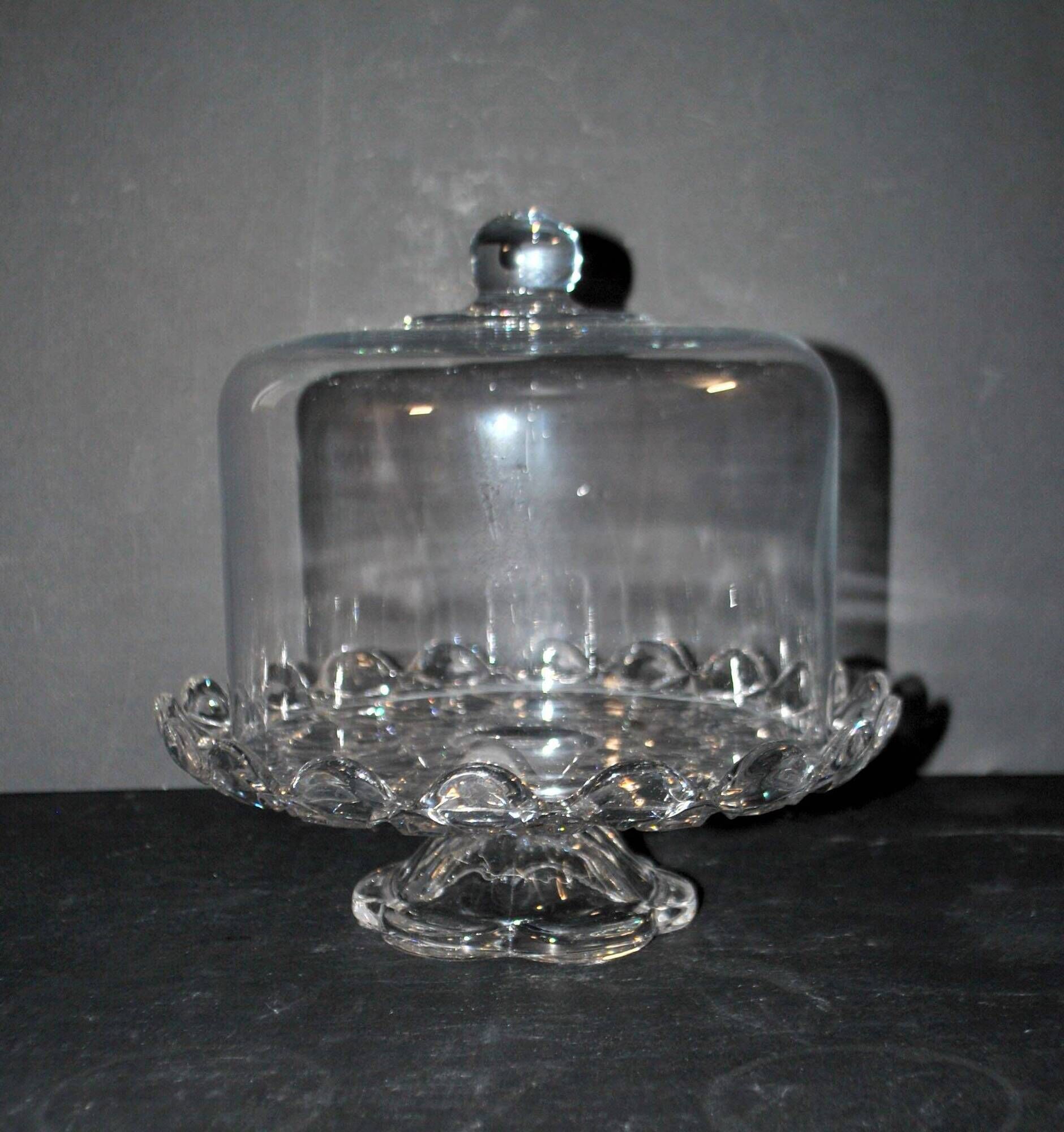 Antique cheese dome on a diamond moulded crystal stand, 1920, marked registered.