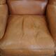 Fauteuil à oreilles en cuir de vache
