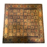 Ancient backgammon in marquetry