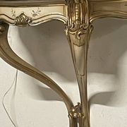 Pair of wall-mounted consoles with a mirror in Louis XV style.