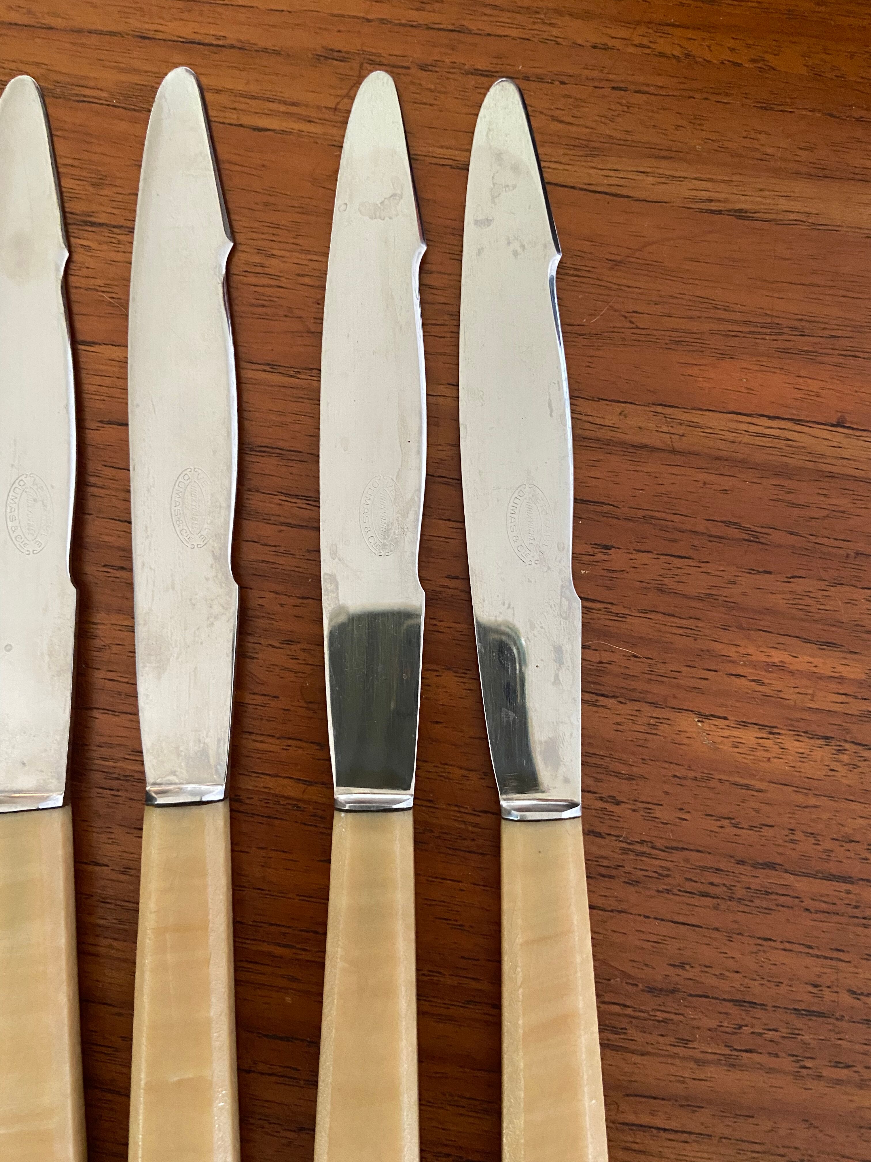 Series of 12 vintage table knives